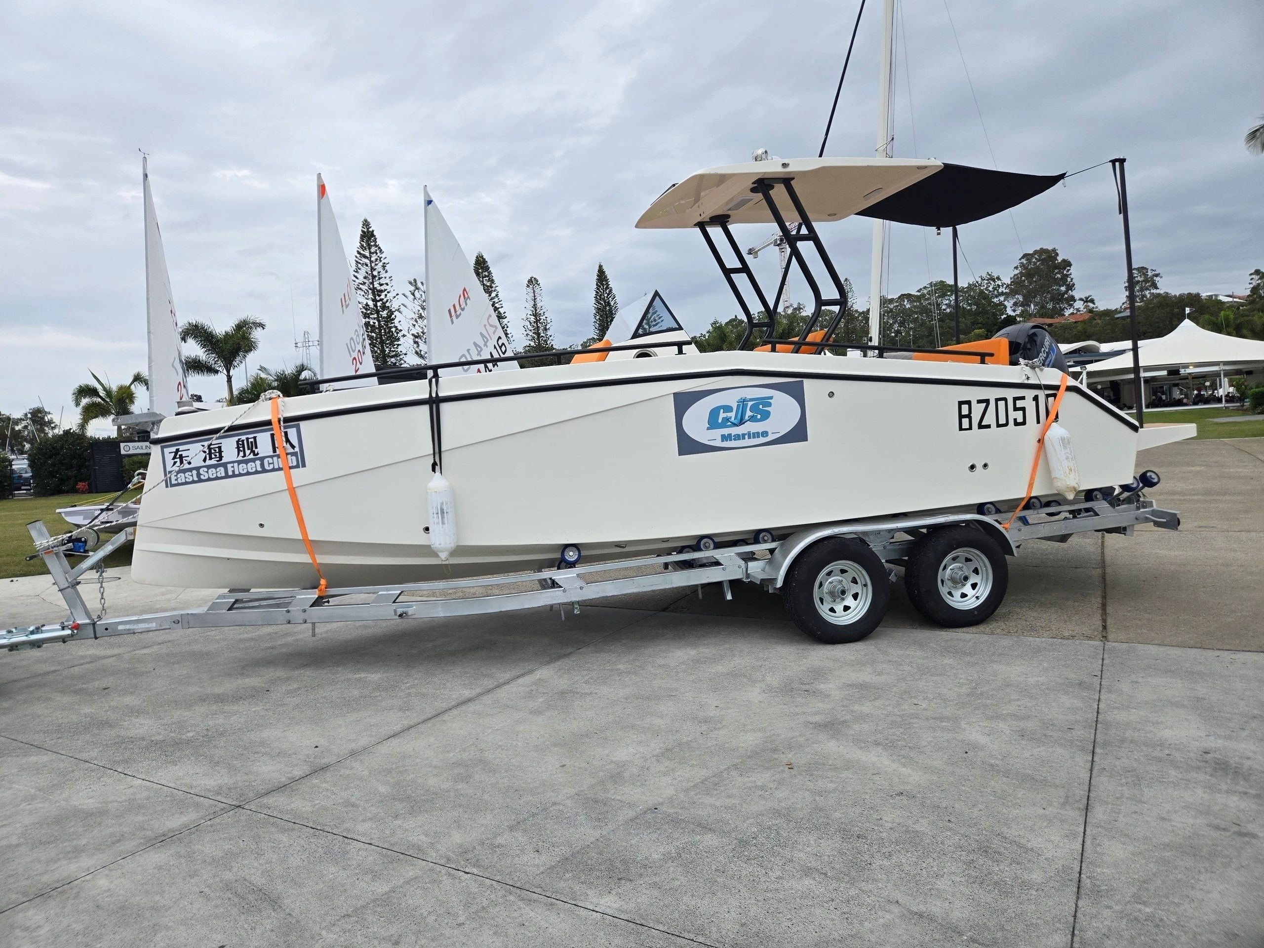 CJS Marine Battle Axe 680 – Side Profile CJS Marine Battle Axe 680 centre console shown on tandem trailer